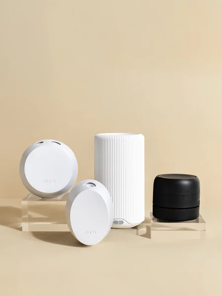 Various home fragrance devices displayed on a beige background. Various home fragrance devices displayed on a beige background.