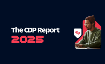 The CDP Report 2025 text with image of a man working on a laptop wearing a beanie.