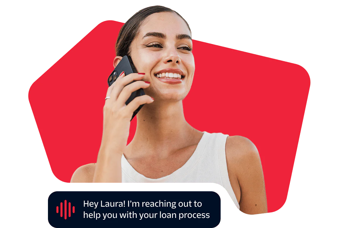 Woman smiling while talking on the phone about a loan process